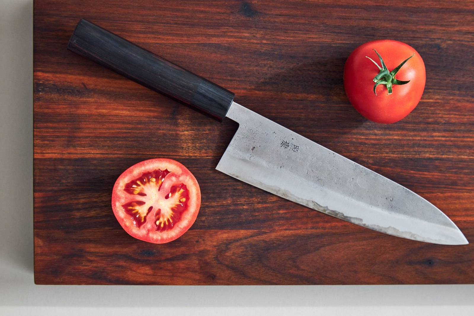 Japanese Kitchen Knife And Tomatos